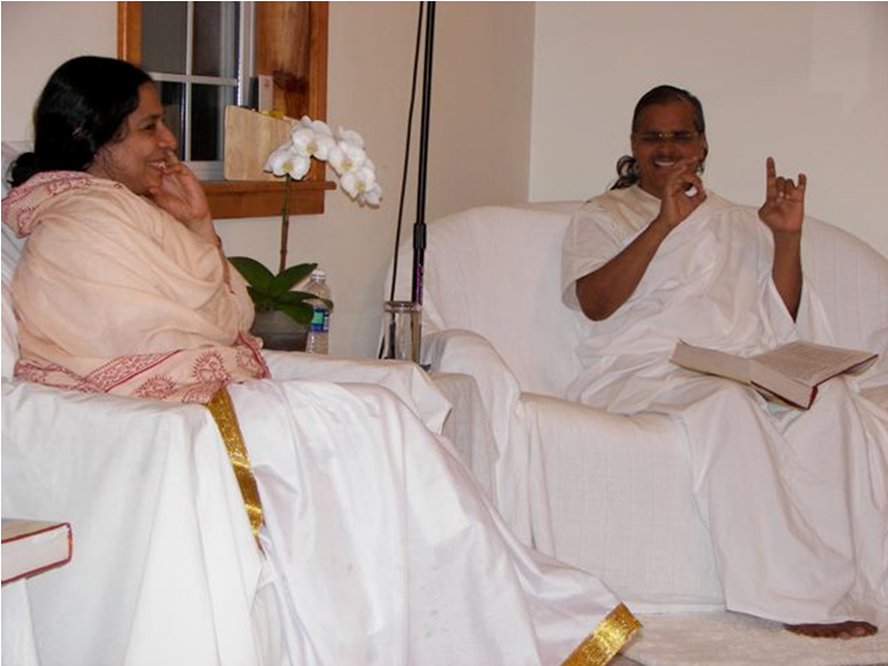 Maa and Swamiji sharing a moment